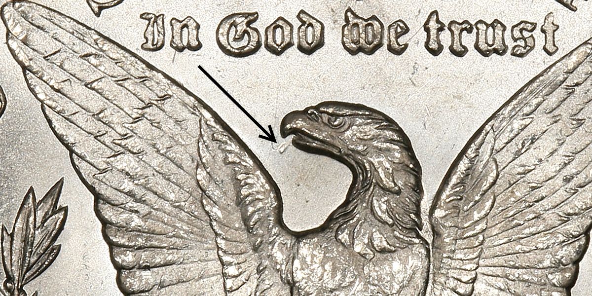 1891-CC Spitting Eagle VAM-3 reverse close-up showing die chip near eagle's beak